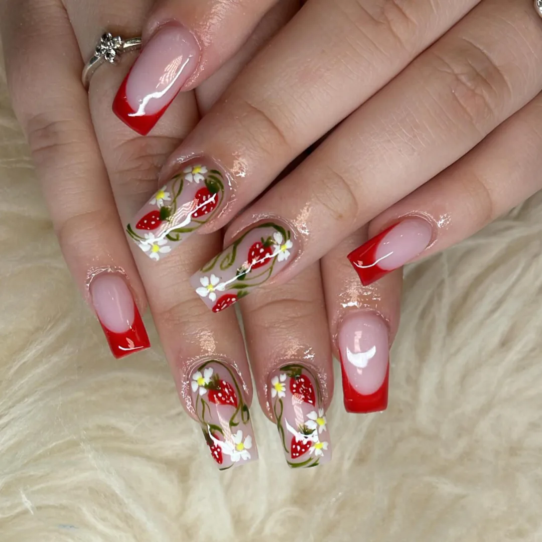 Red French square nails with hand-painted strawberries and flowers by Your Way Nail Spa